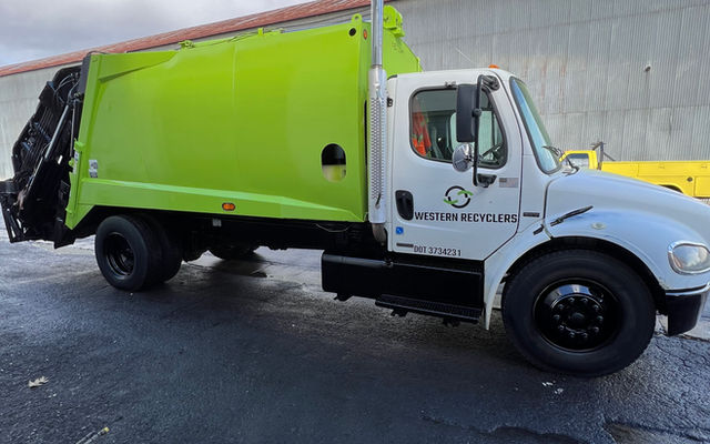 Commercial cardboard collection truck